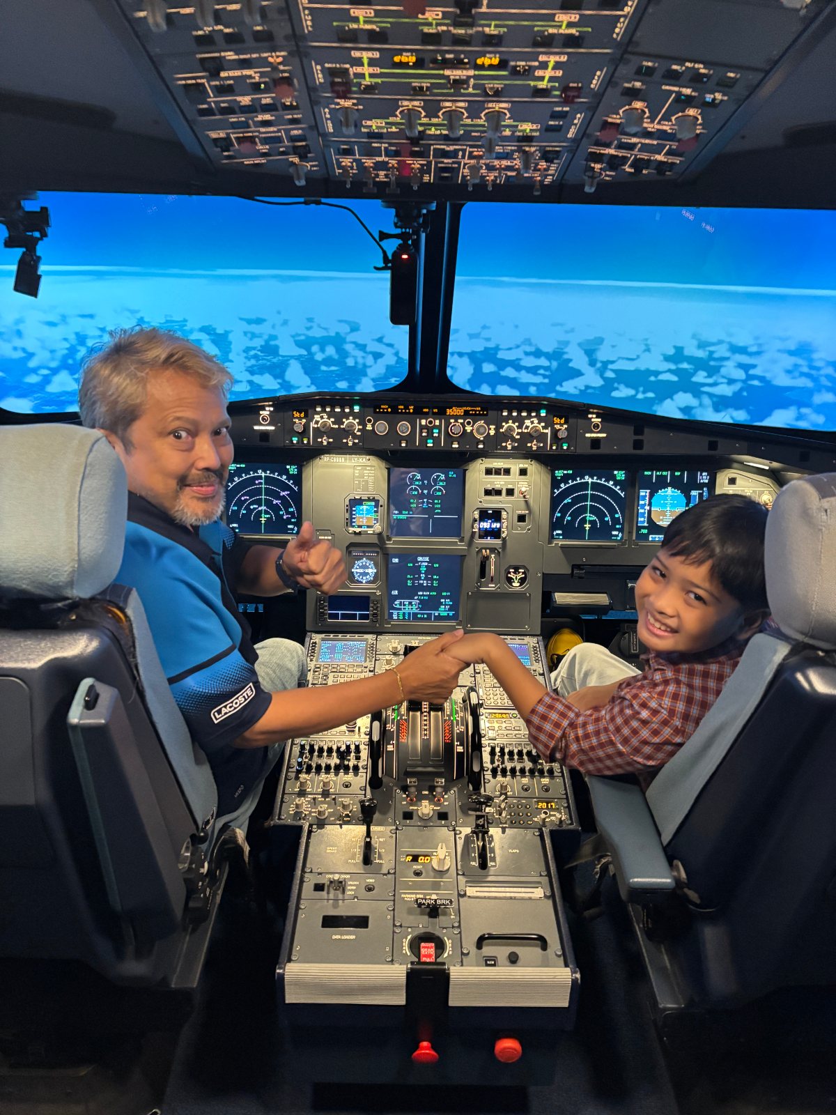 Father and Son experiencing flight